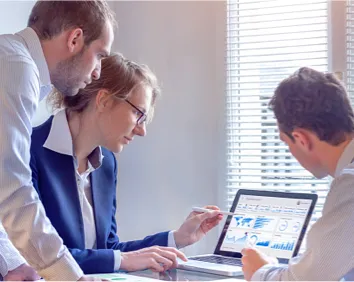 Group Looking at Computer