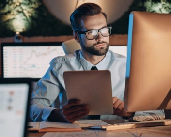 man looking at computer