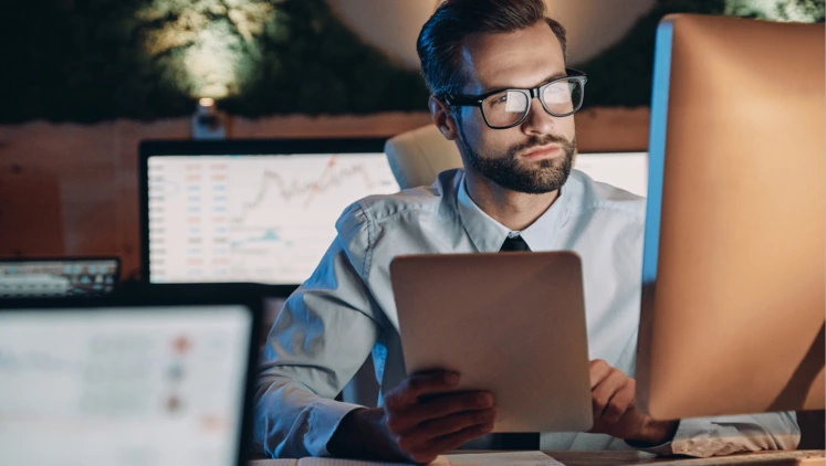 man looking at computer